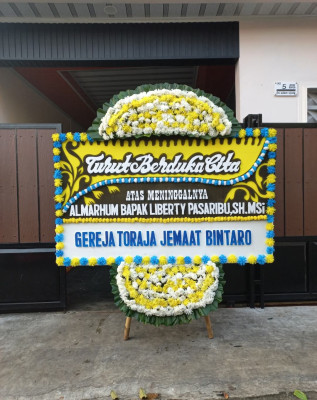 Papan Bunga Duka di Bangunkerto